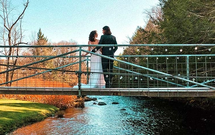 Antrim Streamside Weddings couple on bridge