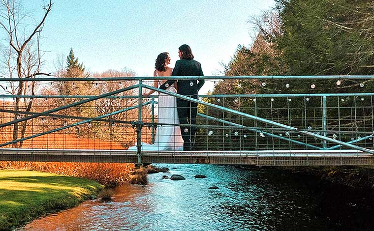 Antrim Streamside Weddings couple on bridge