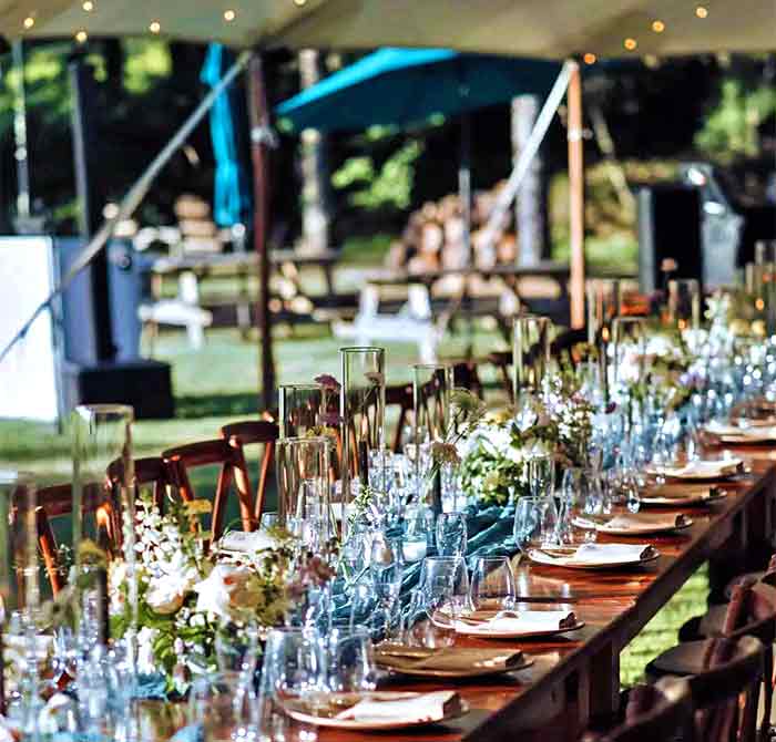 Antrim Streamside Weddings tented ceremony dining table