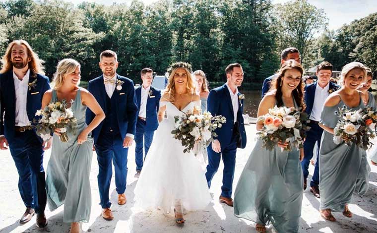 Camp Lindenmere Wedding party in front of lake