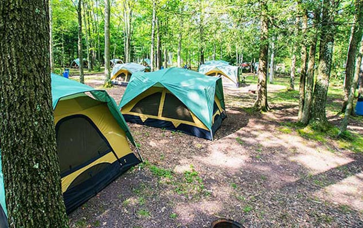 Campground-at-Whitewater-Challengers-tents-woods