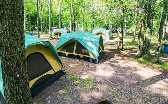 Campground-at-Whitewater-Challengers-tents-woods
