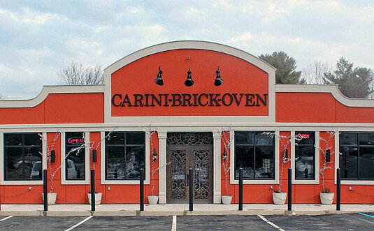 Carini Brick Oven restaurant exterior and parking lot