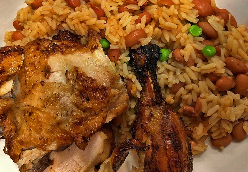 half chicken and rice and peas