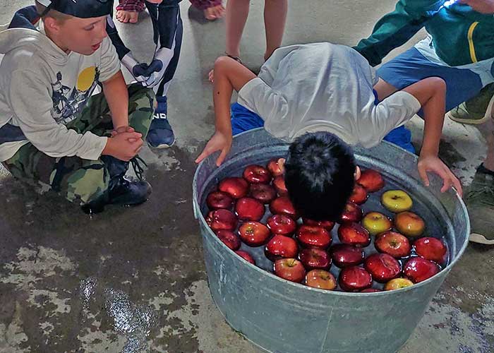 Driftstone Campground apple bobbing at the halloween party