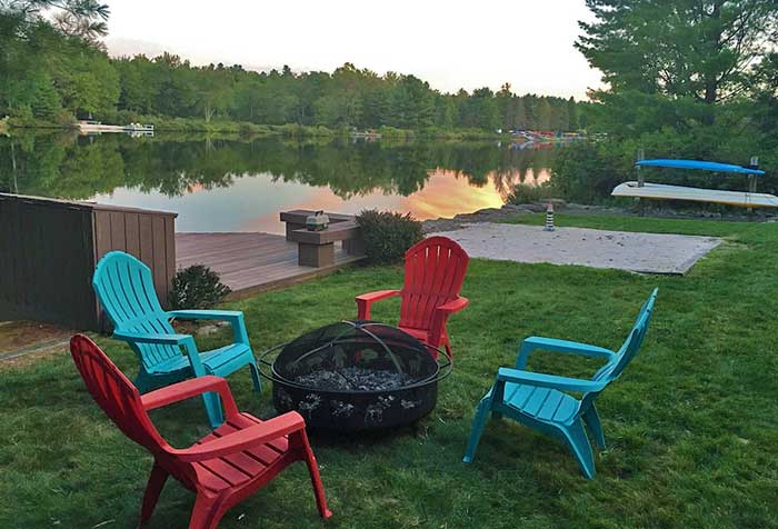 Grand Slam House fire pit and chairs