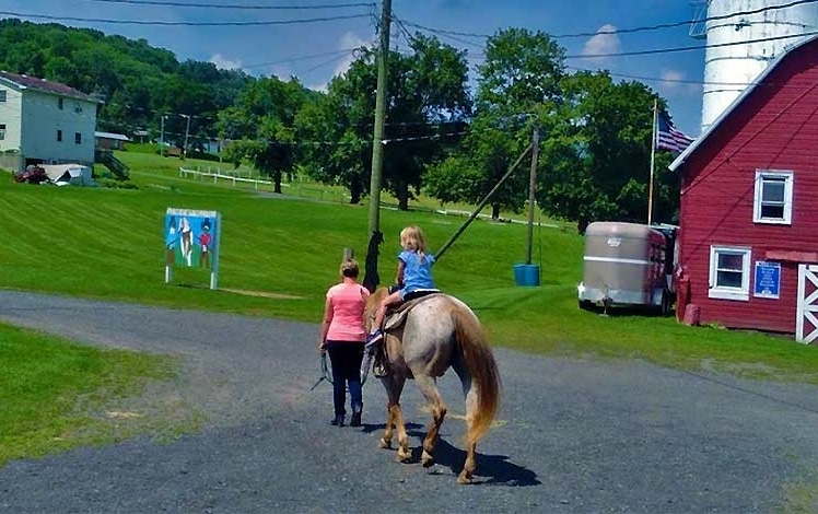 Happy Trails Stables Waymart child on horseback
