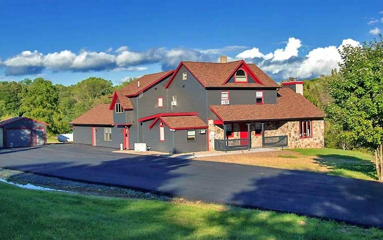 hilltop farmhouse exterior