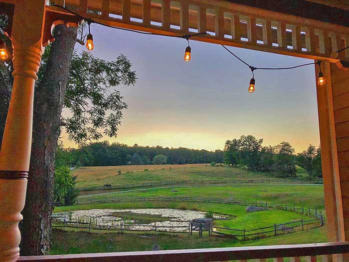 Inn at Tyler Hill B&B view of pond and pasture from the porch