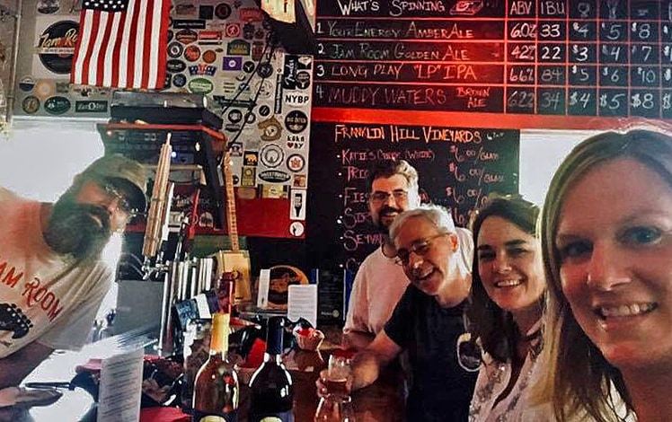 Jam Room Brewing bartender and people sitting at bar