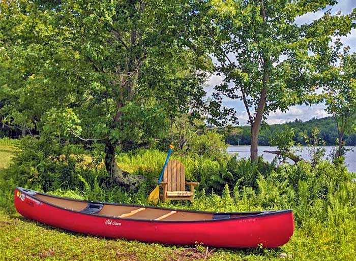 Kenoza Hall lake front canoe