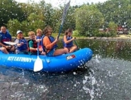 Kittatinny Campgrounds Barryville family on raft on the Delaware
