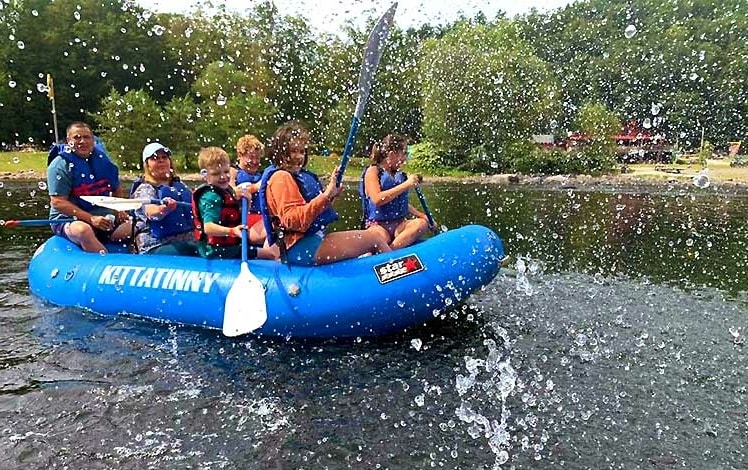 Kittatinny Campgrounds Barryville family on raft on the Delaware