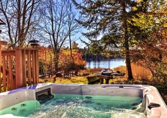 Lakefront Pocono Summit Retreat hot tub