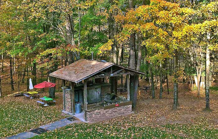 Large Modern Cabin with Hot Tub outdoor grill area and picnic tables