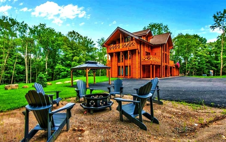 Log Cabin with Pool Exterior and Fire Pit