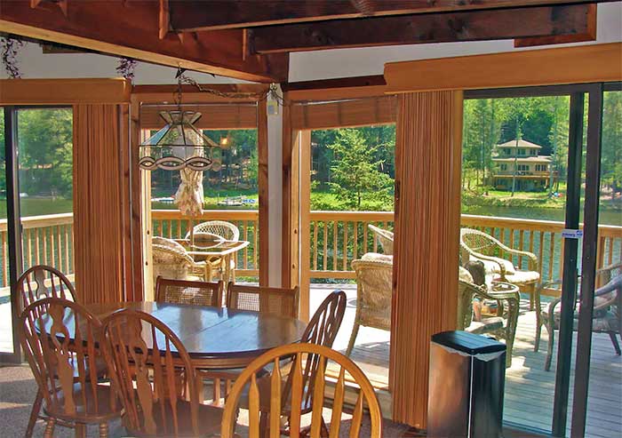 Luxury Lakefront Lake Ariel windows looking out to deck over lake