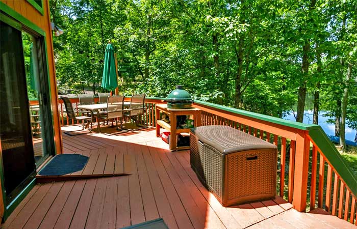 Mana's Treetop Lakehouse Deck Overlooking Lake