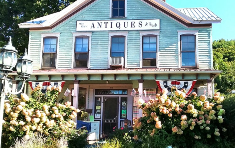 blue painted exterior of 1870s victorian house