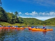 Northeast Wilderness Experience kayaks on the water