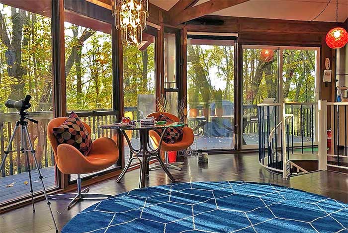 Octagonal Lake House Windows Overlooking Deck