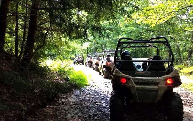 Pocono-Outdoor-Adventure-Tours-line-of-utvs-on-a-path