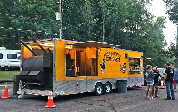 Pork Authority BBQ yellow bbq food truck