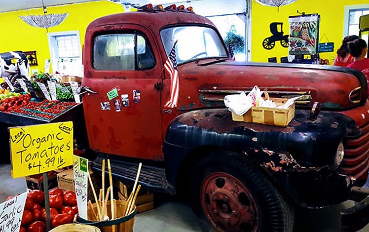 Ritters Farm Market interior and tomato red truck