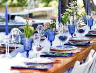 beautiful outdoor wedding dinner tabletop in bue