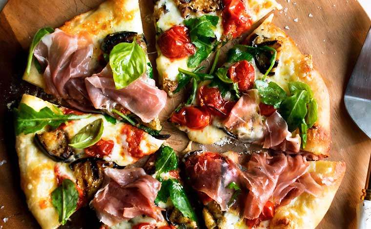 Scarlet Fire Authentic Neapolitan Pizza pie with assorted toppings