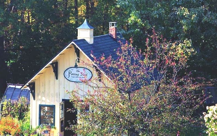 settlers inn potting shed exterior yellow