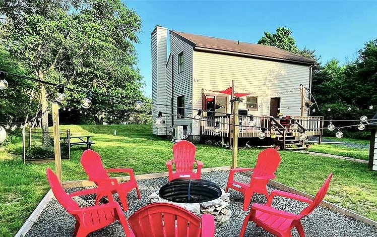 Skylark Cabin exterior and fire pit