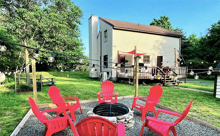 Skylark Cabin exterior and fire pit