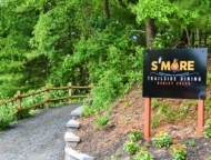 S'more Trailside Dining sign on the trail