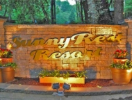 sunny rest resort entrance sign