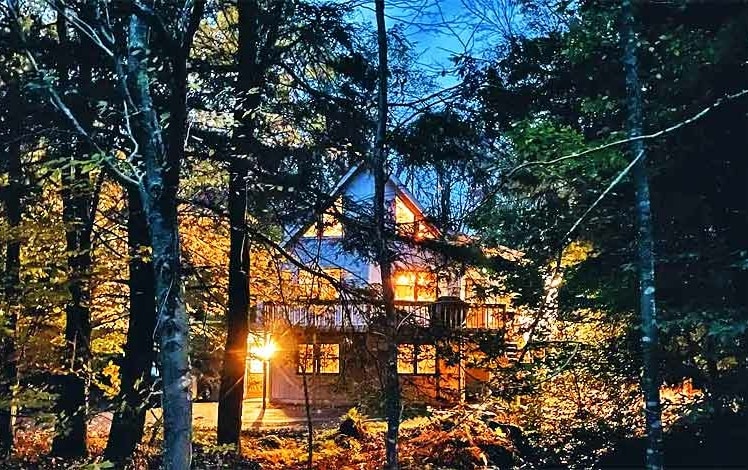 Tall Pines Chalet exterior at night