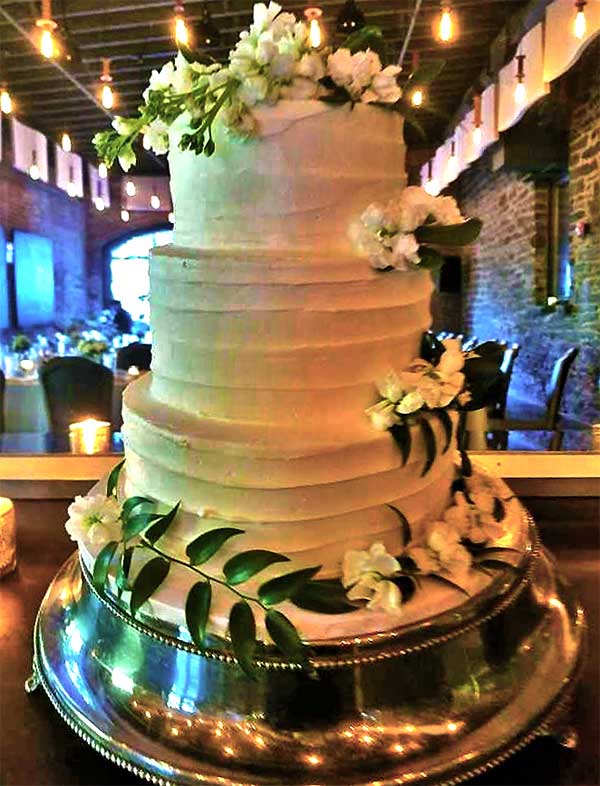 the boiler room event space wedding cake from cocoon coffee house