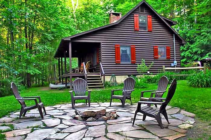 The Knoll on Delaware River side of cabin and fire pit
