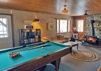 The Muskoday Lake House pool table room