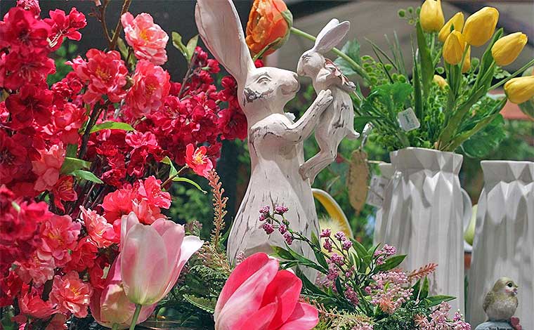 The Potting Shed flowers and rabbit sculpture