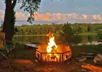The Riverside Cottage fire pit on the river bank