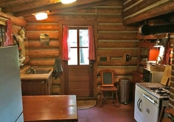Tranquil Lakefront Cabin rustic kitchen