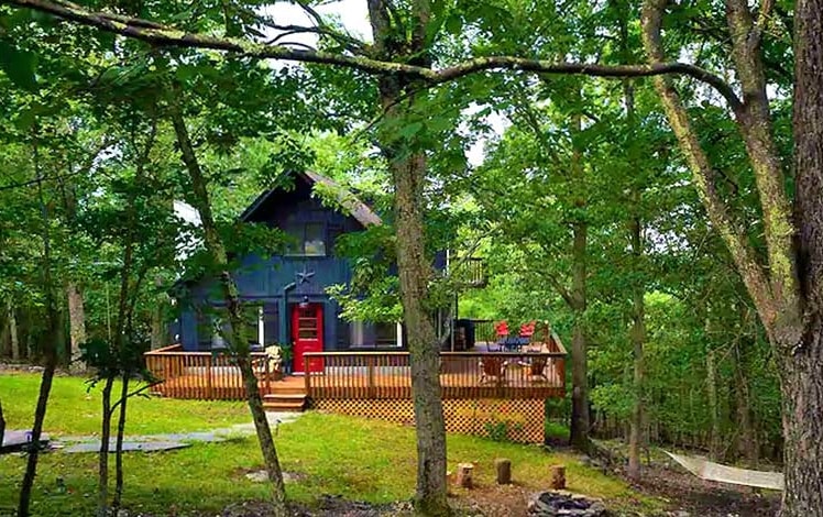 tree top chalet exterior and large yard