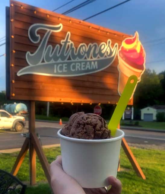 Tutrone’s Ice Cream ice cream cup” width=“547” height=“643” class=
