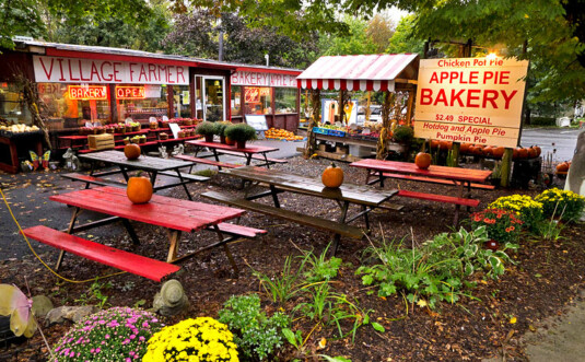 Village Farmer and Bakery exterior of place and picnic tables out front