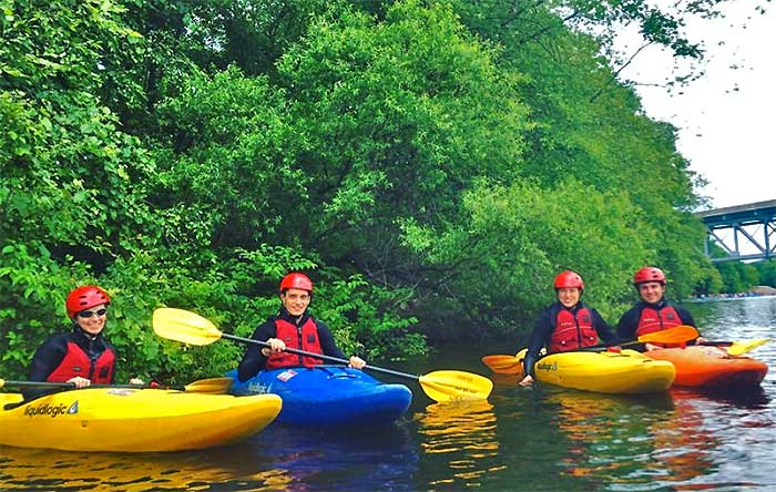 Whitewater Rafting Adventures group of kayakers