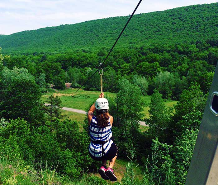 Whitewater Rafting Adventures lady zipliner