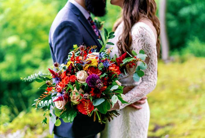 allium floral design couple with bouquet