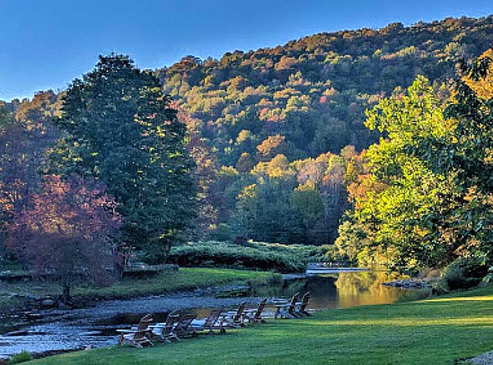 antrim streamside adirondack chairs along the stream