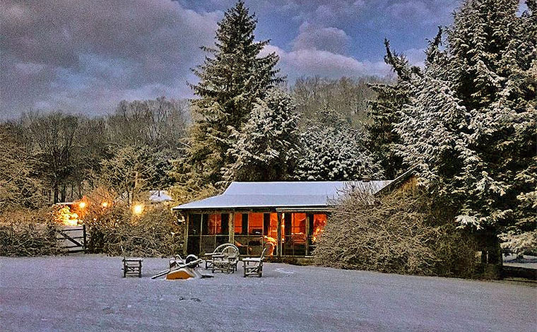 cabin-at-walpack-exterior-in-winter in the snow